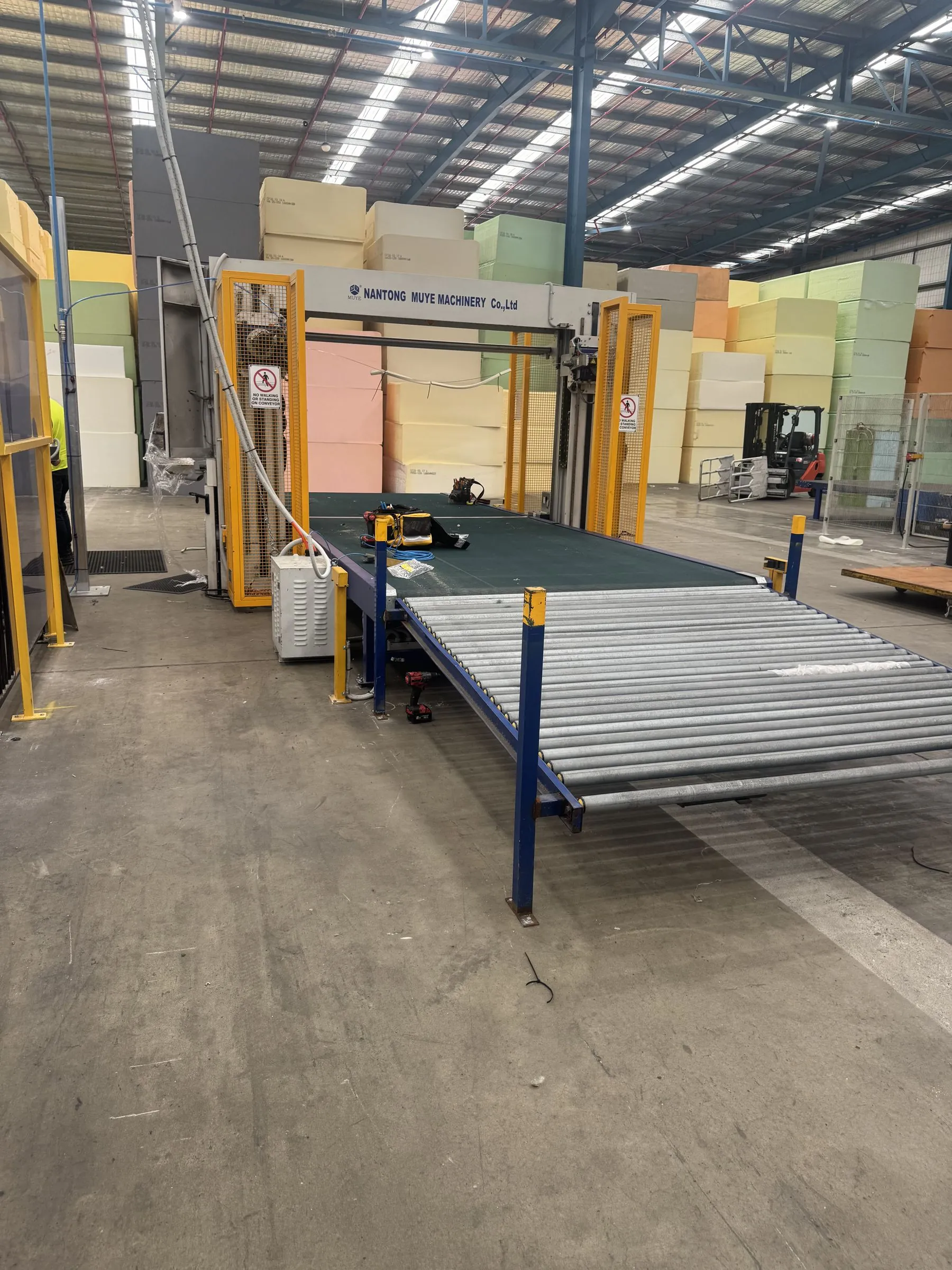 Conveyor installation in progress on a production floor